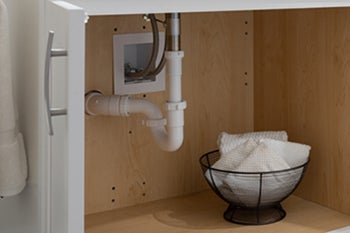 Oatey Supply Box in use under sink