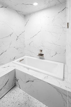 Bath tub in newly renovated bathroom